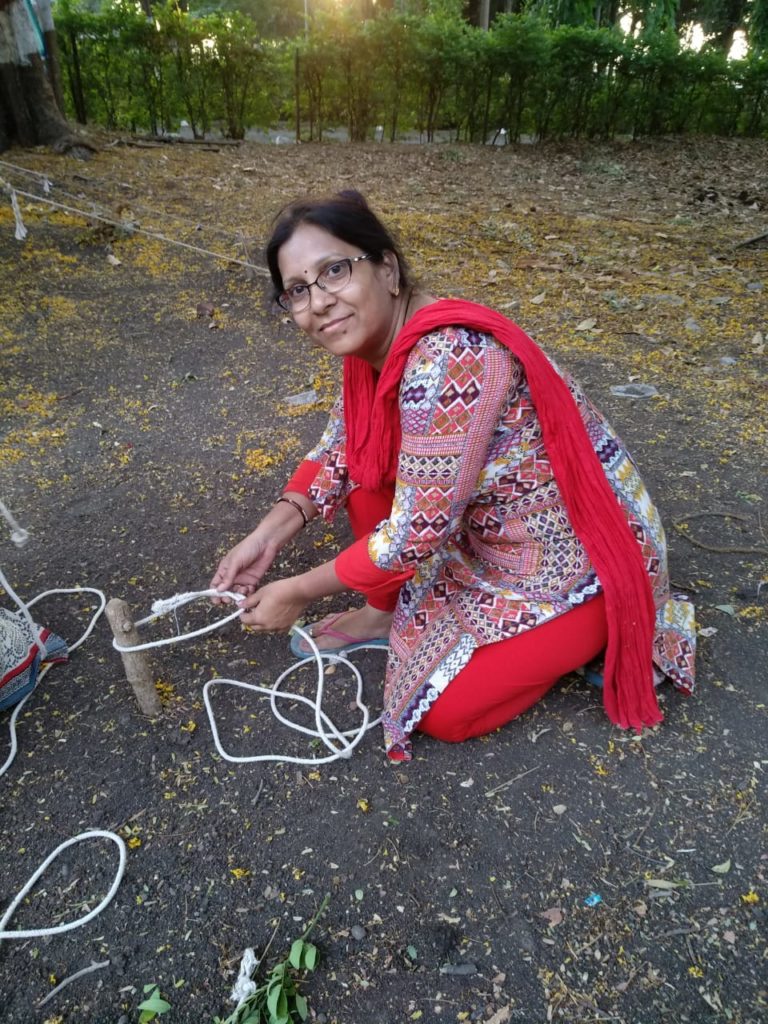 Sharon School Teacher learning how to pitch a tent