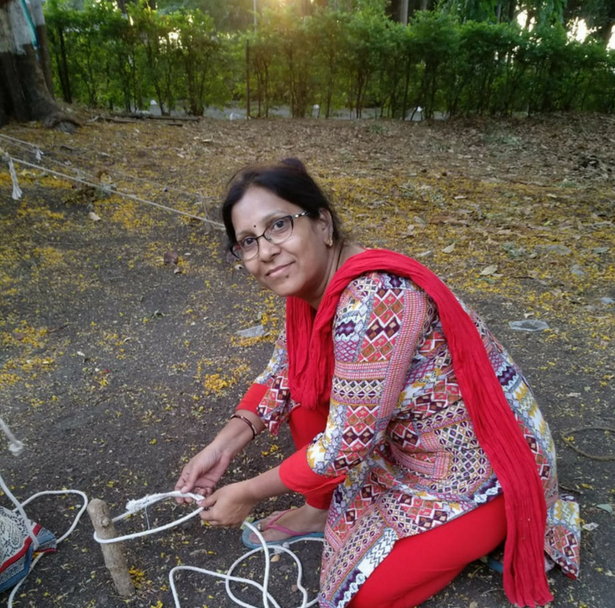 Sharon School Teacher Ms. Paras Pitching a Tent