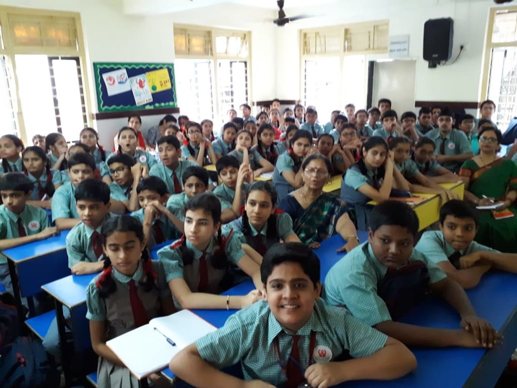 Std. IX students listening intently to the processes involved in blood and organ donation at Sharon School