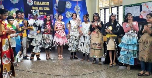 Participants of the Trashion show where they used trash to make fashion statements