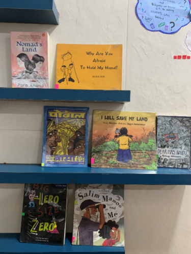 A book display on stories that encourage us to ask questions