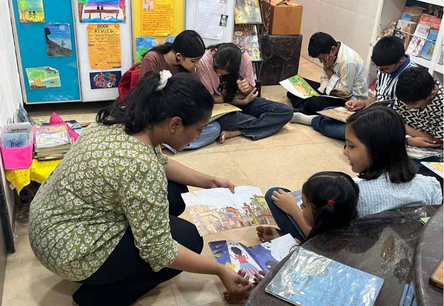 Devyani Jadhav interacting with students